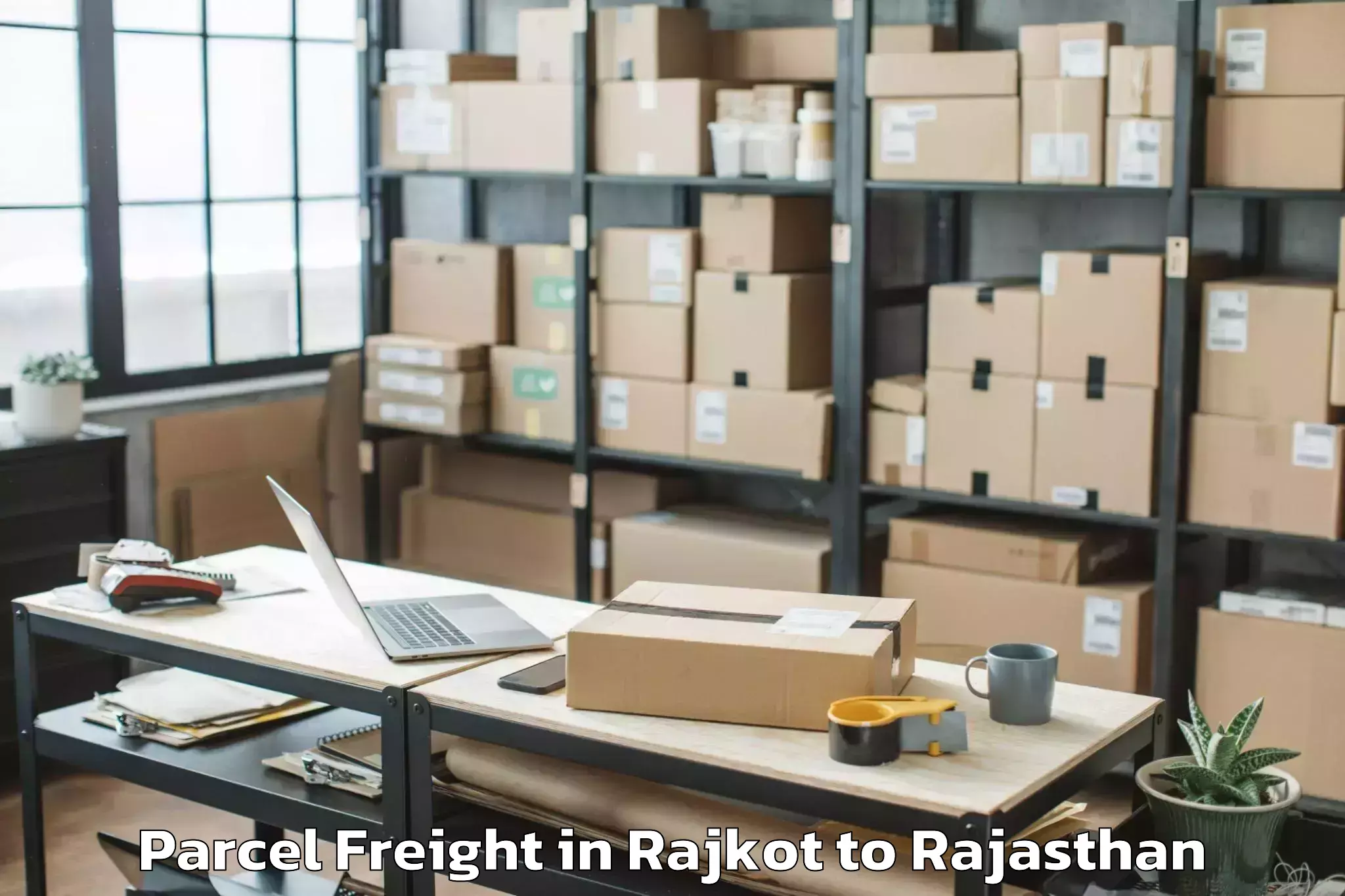 Efficient Rajkot to Abhilashi University Udaipur Parcel Freight